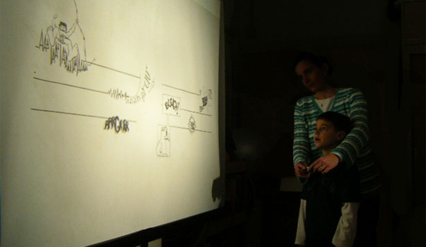 Proiezione della partitura grafica "Stripsody" di C. Berberian e tentativi di decodifica da parte dei bambini